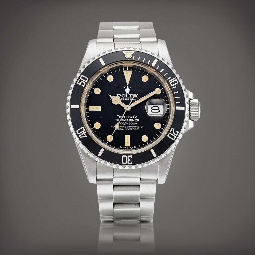 View full screen - View 1 of Lot 2290. Submariner, Reference 16800 A stainless steel wristwatch with date and bracelet, Retailed by Tiffany & Co., Circa 1985 | 勞力士 Submariner | 型號16800 | 精鋼鏈帶腕錶,備日期顯示,由Tiffany &. Co發行,約1985年製.