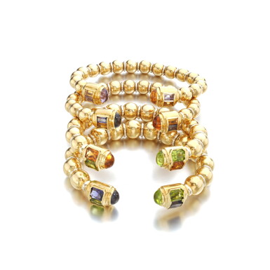 View full screen - View 1 of Lot 130. Suite of gold and gemset bangles.