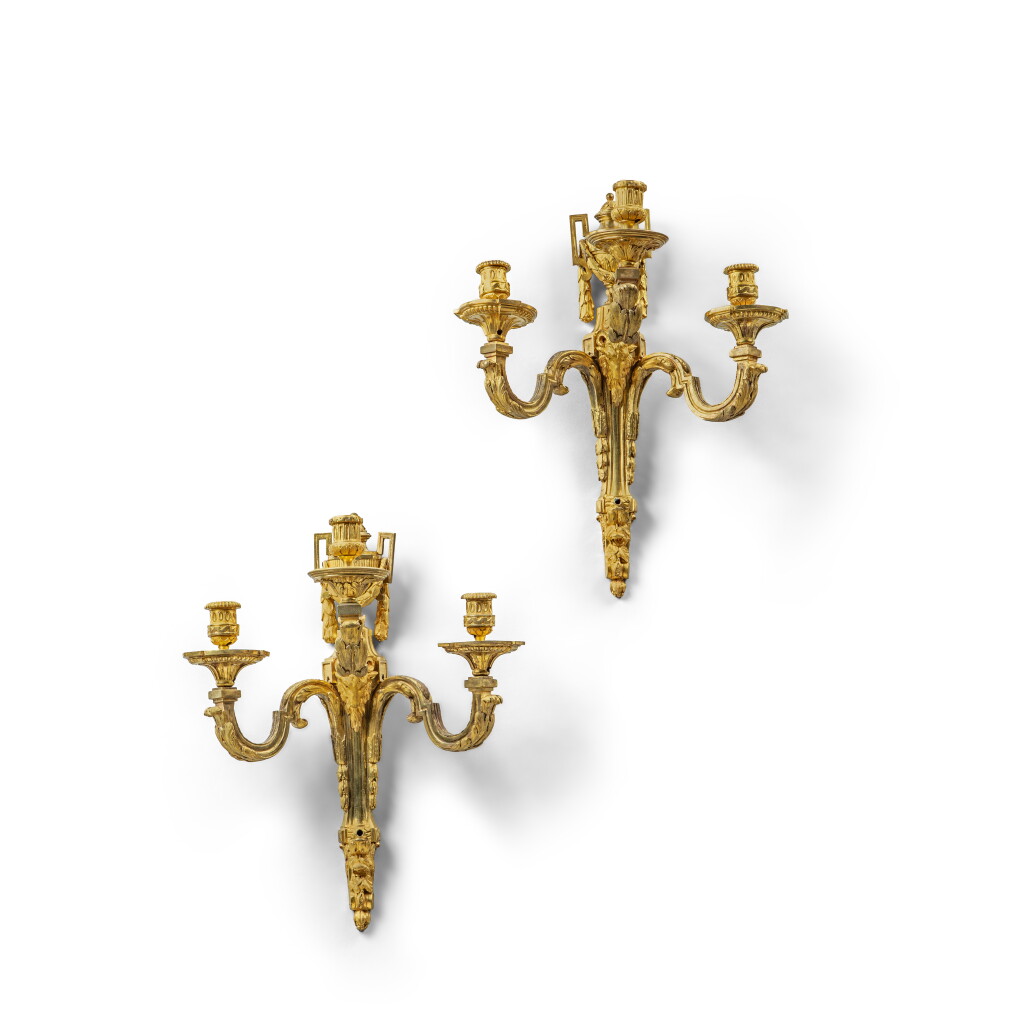 View full screen - View 1 of Lot 249. A pair of Louis XV gilt-bronze three-light wall-lights, circa 1770.
