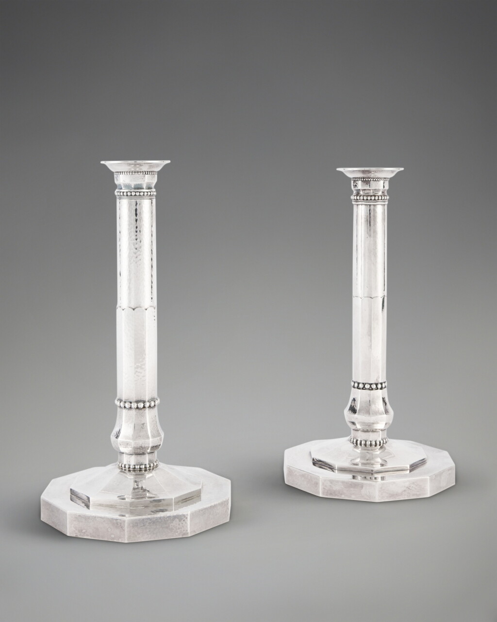 View full screen - View 1 of Lot 402. A Pair of Danish Silver Candlesticks, No. 286, Designed by Johan Rohde for Georg Jensen Silversmithy, Copenhagen, 1945-77.