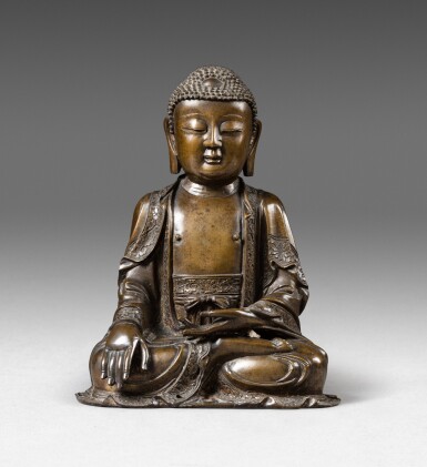 View full screen - View 1 of Lot 61. A bronze figure of seated Buddha Ming dynasty, 17th century | 明十七世紀 銅佛坐像.