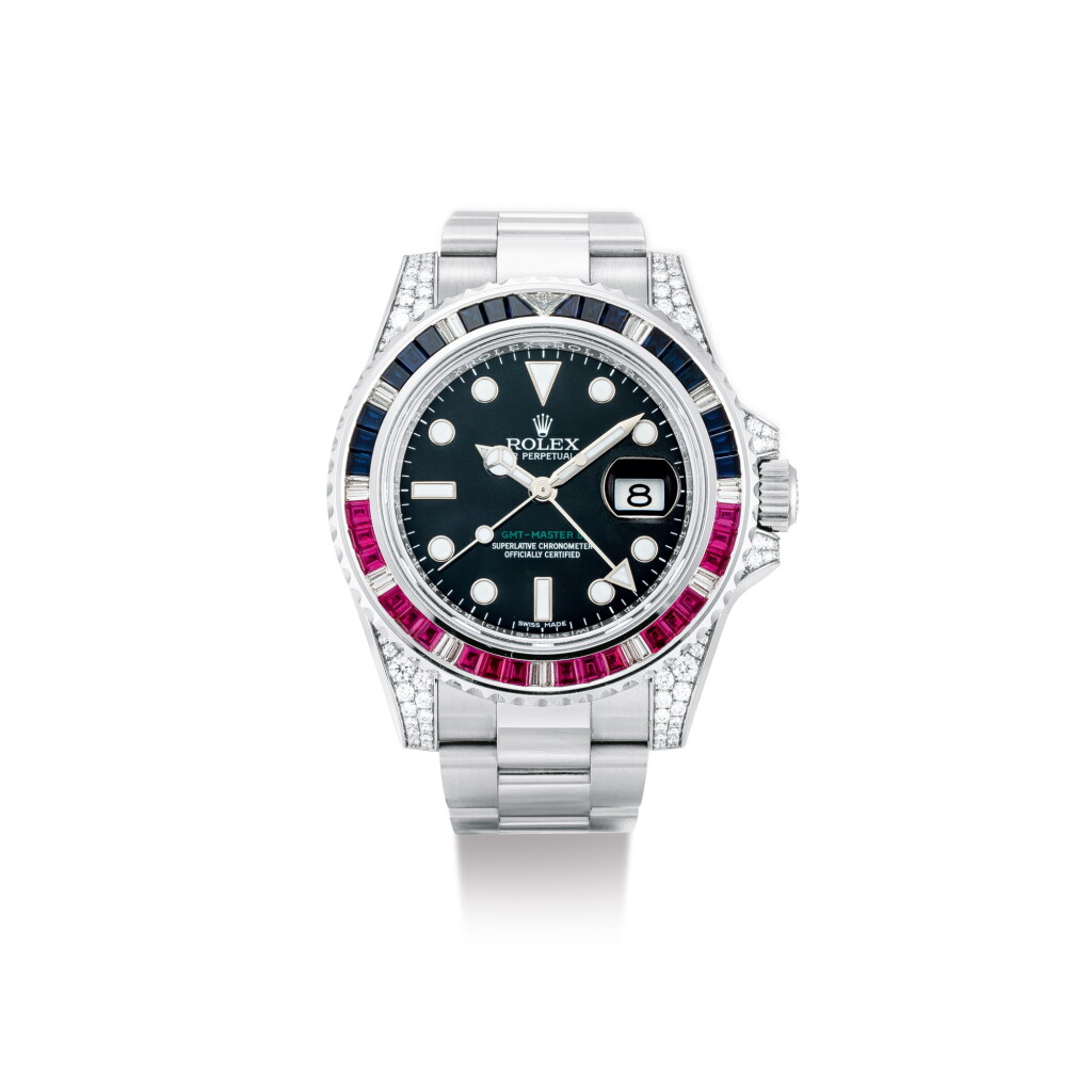 View full screen - View 1 of Lot 2119. ROLEX | GMT-MASTER II 'SARU', REFERENCE 116759, A WHITE GOLD, DIAMOND, SAPPHIRE AND RUBY-SET DUAL TIME ZONE WRISTWATCH WITH DATE AND BRACELET, CIRCA 2012 | 勞力士 | "GMT-Master II 型號116759 SARU 白金鑲鑽石、藍寶石及紅寶石兩地時間鏈帶腕錶,備日期顯示,錶殼編號2W316610,約2012年製".