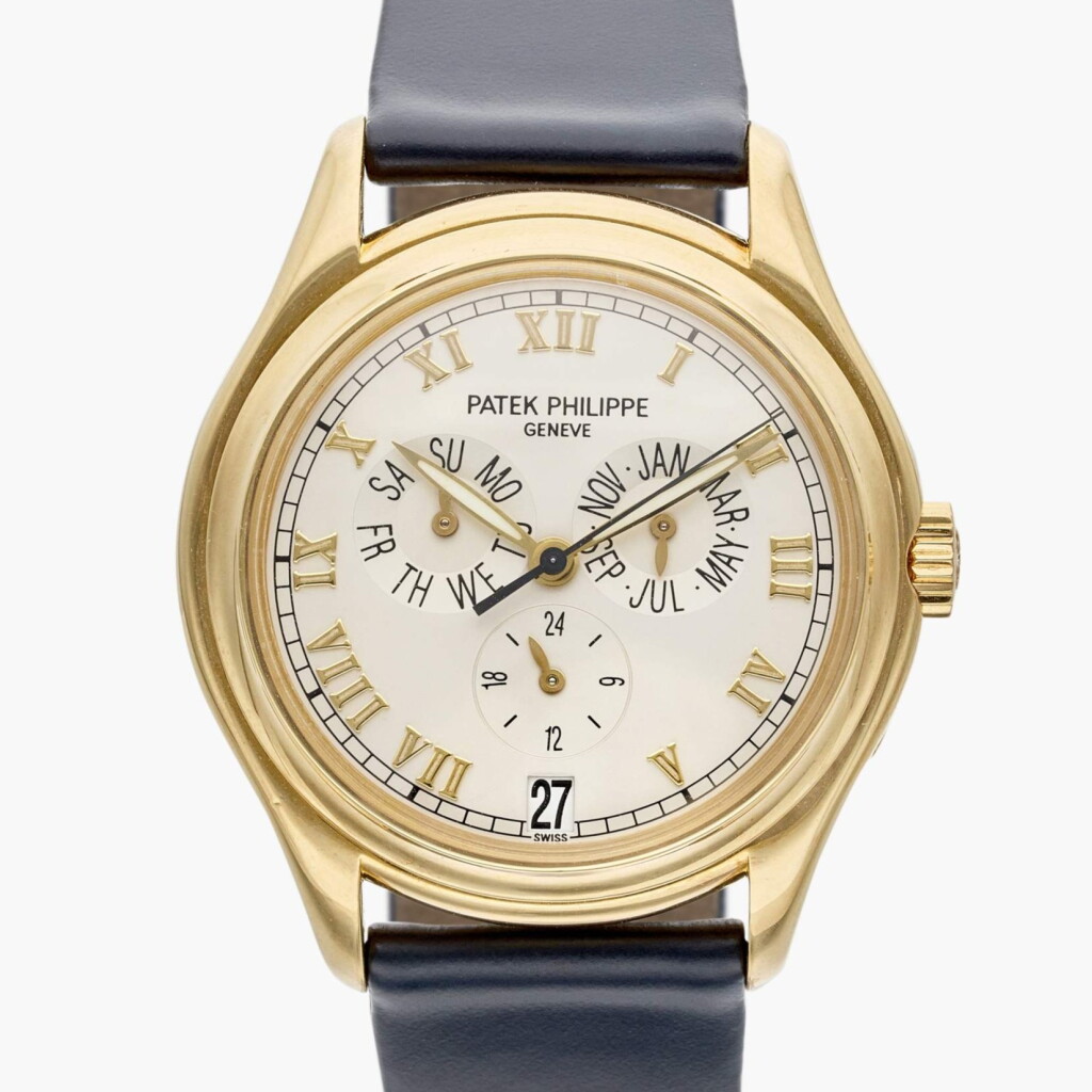 View full screen - View 1 of Lot 461. Reference 5035 | A yellow gold automatic annual calendar wristwatch with 24 hour indication, Circa 1998.