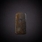 A celadon and russet jade blade, yue, Neolithic period | 新石器時代 青玉鉞