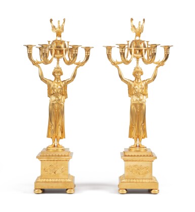 View full screen - View 1 of Lot 176. A pair of Empire style gilt-bronze candelabra.