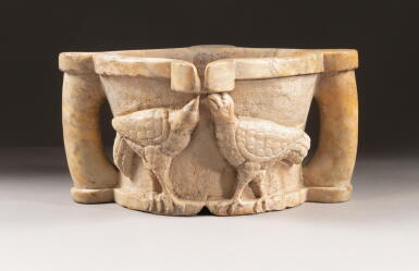 View full screen - View 1 of Lot 3. SOUTHERN ITALIAN, CIRCA 12TH CENTURY | MORTAR WITH AN EAGLE AND TWO DRINKING BIRDS.
