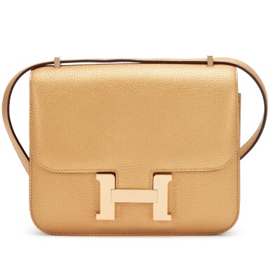 View full screen - View 1 of Lot 20. Limited Edition Dore Chèvre Chamkilight Metallic Mini Constance 18 Permabrass Hardware, 2024.