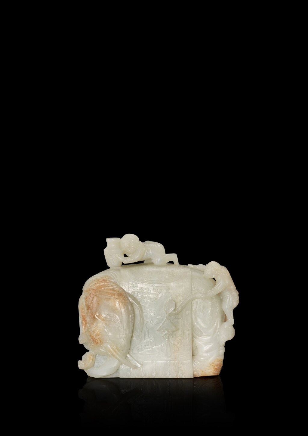 View full screen - View 1 of Lot 3702. A white and russet jade 'elephant and foreigner' group, Qing dynasty, 18th century | 清十八世紀 白玉胡人洗象.