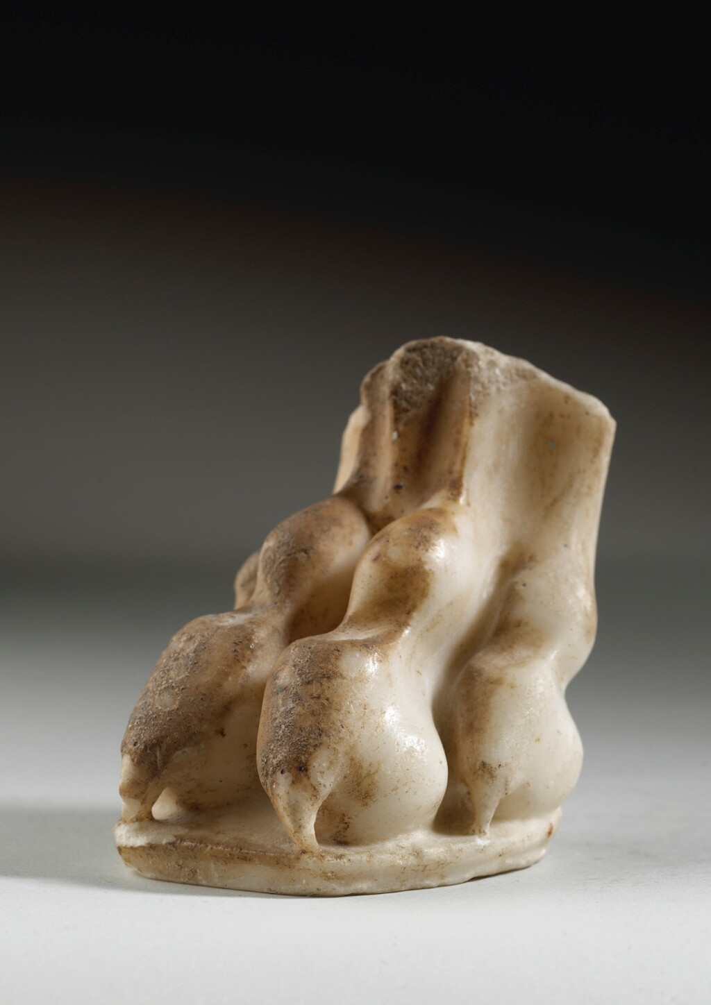 View full screen - View 1 of Lot 53. A ROMAN MARBLE FELINE PAW, CIRCA 2ND CENTURY A.D..