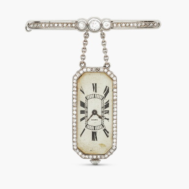 View full screen - View 1 of Lot 2460. London retailed | A platinum and diamond-set baguette-form pendant watch with matching diamond-set bar brooch, Circa 1913.