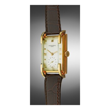 View full screen - View 1 of Lot 919. PATEK PHILIPPE | REF 1511, A YELLOW GOLD RECTANGULAR WRISTWATCH, MADE IN 1942 | 百達翡麗 | 1511型號黃金腕錶,1942年製.