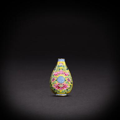 View full screen - View 1 of Lot 3427. A Canton enamel yellow-ground 'lotus and bat' snuff bottle, Mark and period of Yongzheng | 清雍正 銅胎畫琺瑯黃地福壽連綿鼻煙壺 《雍正年製》款.