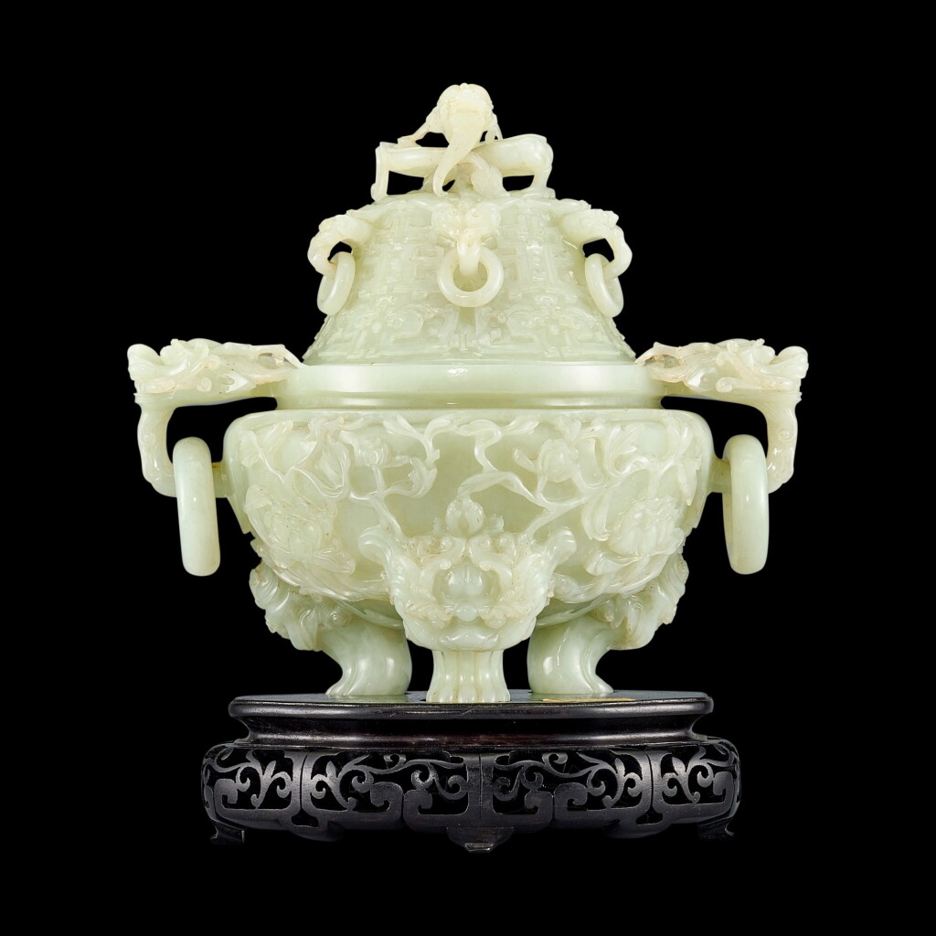View full screen - View 1 of Lot 2092. A large pale celadon dragon-handled incense burner and cover Late Qing dynasty - Republican period | 清末至民國 青白玉龍耳銜環三足蓋爐.