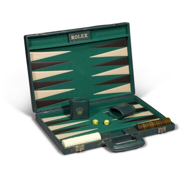 View full screen - View 1 of Lot 715. GREEN LEATHER BACKGAMMON SET COMPLETE WITH TWO LEATHER CUPS, CHECKERS AND DICE CIRCA 1960.