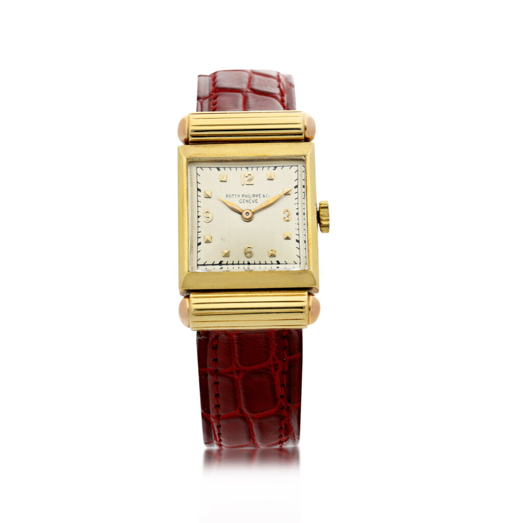 View full screen - View 1 of Lot 52. A YELLOW GOLD RECTANGULAR WRISTWATCH, CIRCA 1940.