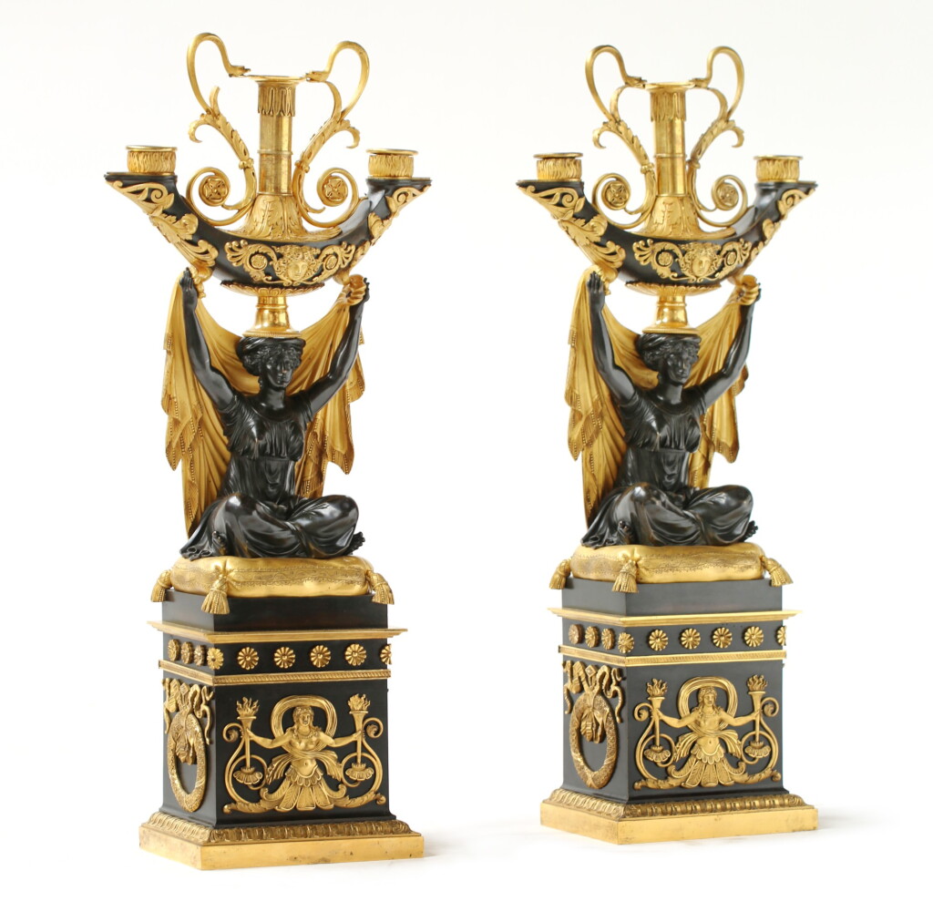View full screen - View 1 of Lot 113. A PAIR OF GILT AND PATINATED BRONZE CANDELABRA, ATTRIBUTED TO CLAUDE GALLE (1759-1815), CIRCA 1800 | PAIRE DE CANDÉLABRES EN BRONZE PATINÉ ET DORÉ ATTRIBUÉE À CLAUDE GALLE (1759-1815), VERS 1800.