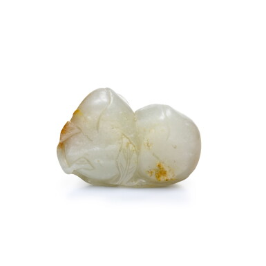 View full screen - View 1 of Lot 203. A RUSSET-STAINED WHITE JADE 'PEACH' GROUP, QING DYNASTY, 18TH CENTURY | 清十八世紀 白玉帶皮雙桃把件.