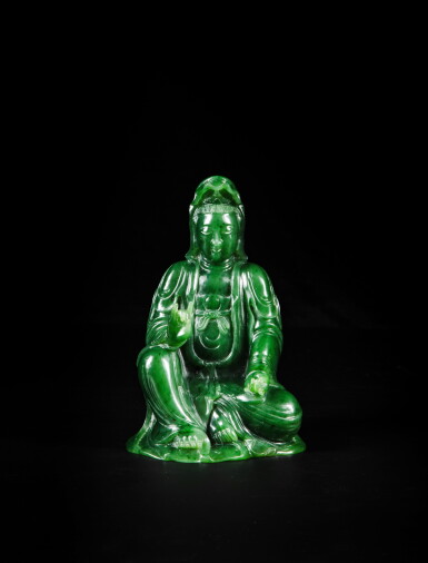 View full screen - View 1 of Lot 222. A spinach-green jade figure of a seated Guanyin, Qing dynasty | 清 碧玉觀音菩薩坐像.