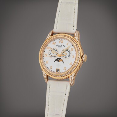 View full screen - View 1 of Lot 128. Reference 4937 | A pink gold and diamond-set annual calendar wristwatch with moon phases and mother-of-pearl dial, Circa 2010.