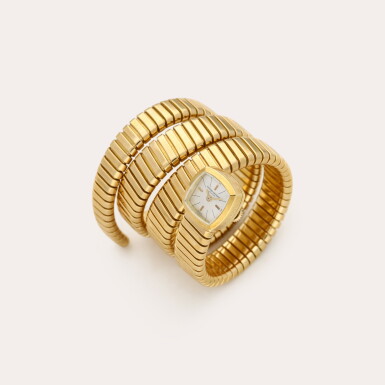 View full screen - View 1 of Lot 333. Retailed by Bulgari: Tubogas | A yellow gold cuff watch | Circa 1970.