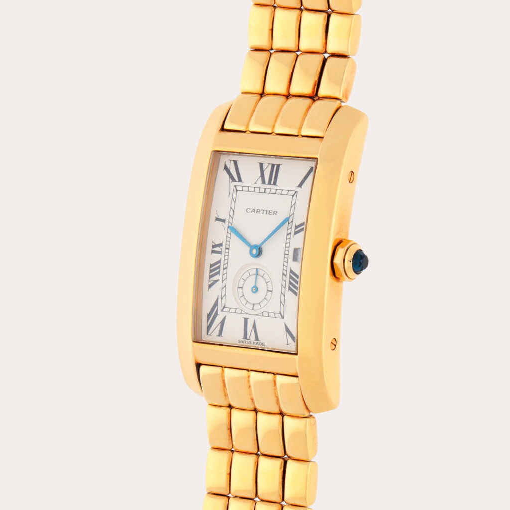 View full screen - View 1 of Lot 247. Tank Américaine, Reference 811904 | A yellow gold wristwatch with date and bracelet | Circa 2000.