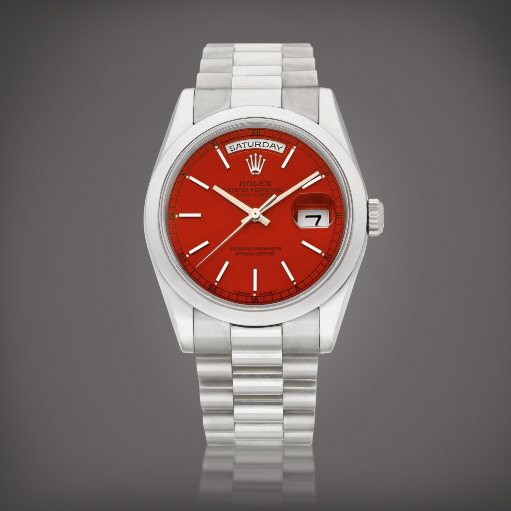 View full screen - View 1 of Lot 2200. Day-Date, Reference 118209 | A white gold wristwatch with day, date, bracelet and red lacquered dial, Circa 2002 | 勞力士 | Day-Date 型號 118209 | 白金鏈帶腕錶,備日期、星期顯示及紅色漆製錶盤,約2002年製.