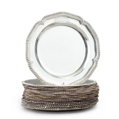 View full screen - View 1 of Lot 98. A group of 18 silver plates with coats-of-arms, 12, Peter Taylor, London, 1746 and 6, Andrew Fobelberg & Stephen Gilbert, London, 1781 | 18 assiettes en argent gravées d'armoiries, 12 par Peter Taylor, Londres, 1746 et 6 par Andrew Fobelberg & Stephen Gilbert, Londres, 1781 .