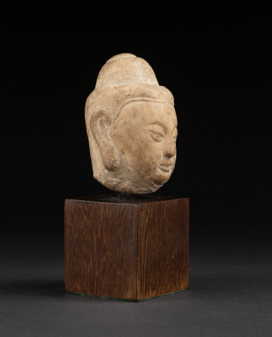 View full screen - View 1 of Lot 16. A small marble head of Buddha Tang dynasty | 唐 大理石雕佛首.