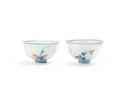 View full screen - View 1 of Lot 62. A pair of blue and white and underglaze red 'floral' bowls Qing dynasty, Kangxi period | 清康熙 青花釉裏紅花卉紋盌一對.