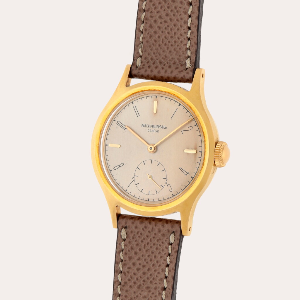 View full screen - View 1 of Lot 51. Calatrava, Reference 565 | A yellow gold wristwatch | Made in 1947.
