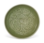 A YAOZHOU CELADON CARVED 'FLORAL' BOWL JIN DYNASTY | 金 耀州青釉磕花卉紋歛口盌