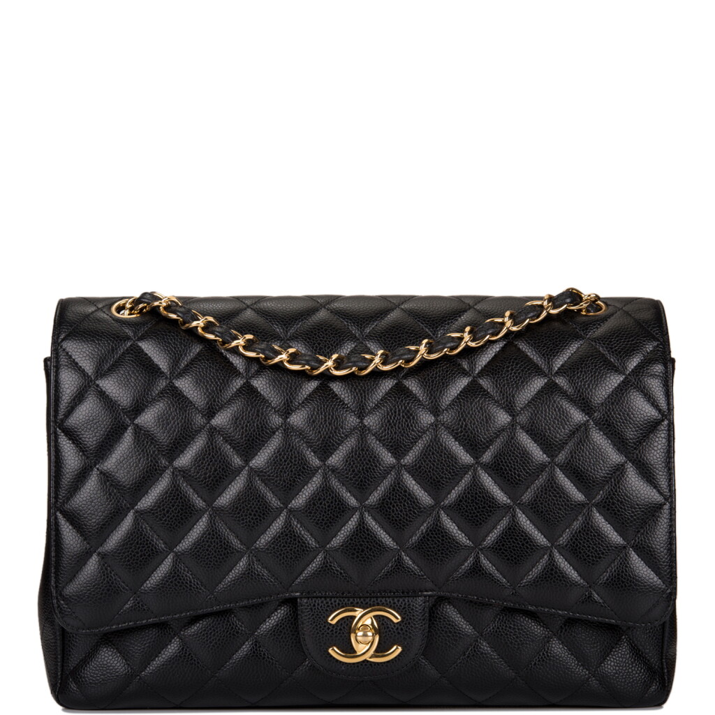 View full screen - View 1 of Lot 60. Chanel Quilted Maxi Classic Double Flap Bag of Black Caviar Leather with Gold Hardware.