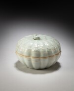 A Qingbai lobed cosmetic box and cover, Yuan dynasty | 元 白釉花卉紋胭脂蓋盒