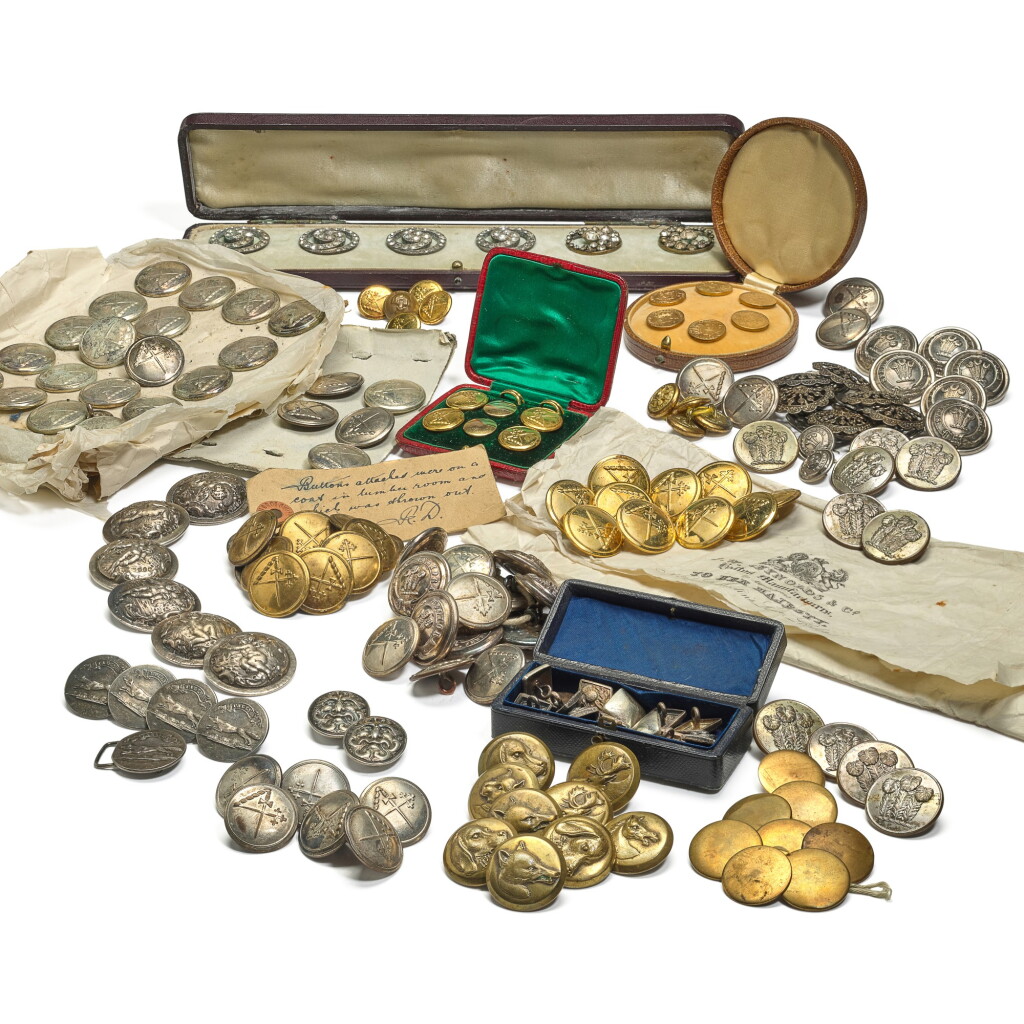 View full screen - View 1 of Lot 133. A collection of Victorian die-stamped gilt-metal livery buttons with the crest of Adam by Reynolds of London, late 19th century.