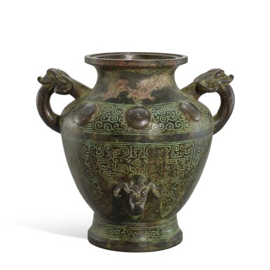 View full screen - View 1 of Lot 3018. An inscribed archaistic malachite-and-silver inlaid bronze wine vessel, lei, Song dynasty 宋 銅錯銀嵌綠松石仿古獸耳罍.