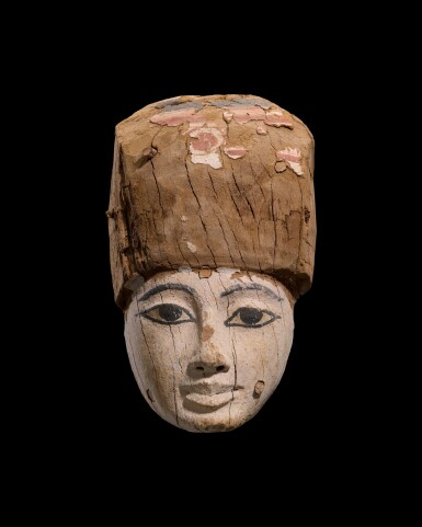 View full screen - View 1 of Lot 125. An Egyptian Wood Mummy Mask, 22nd/26th Dynasty, 944-525 B.C..