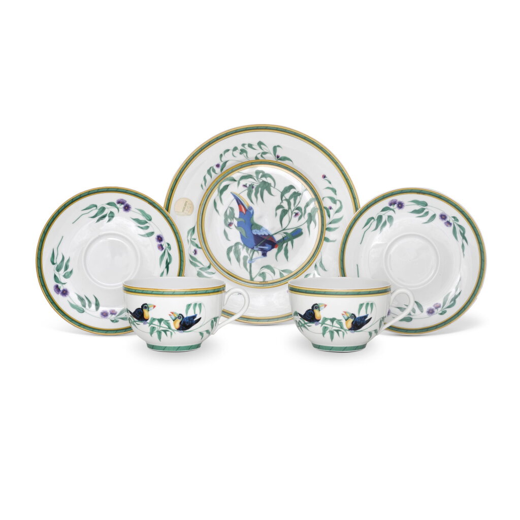 View full screen - View 1 of Lot 680. An Hermès Limoges porcelain 'Toucans' pattern plate and two large coffee cups and saucers, 20th century.