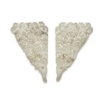 A pair of reticulated celadon jade ornaments, 19th / 20th century