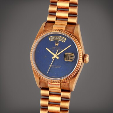 View full screen - View 1 of Lot 312. Day-Date, Reference 18038 | A yellow gold wristwatch with day, date, bracelet and lapis lazuli dial | Circa 1987.