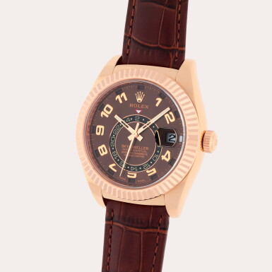 View full screen - View 1 of Lot 75. Sky-Dweller, Reference 326135 | A pink gold dual time zone annual calendar wristwatch with date | Circa 2015.