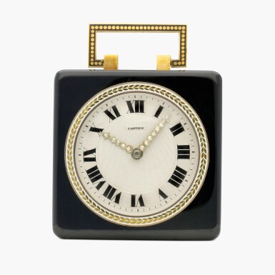 View full screen - View 1 of Lot 2105. An onyx, yellow gold and enamel 8-day desk clock, Circa 1919.