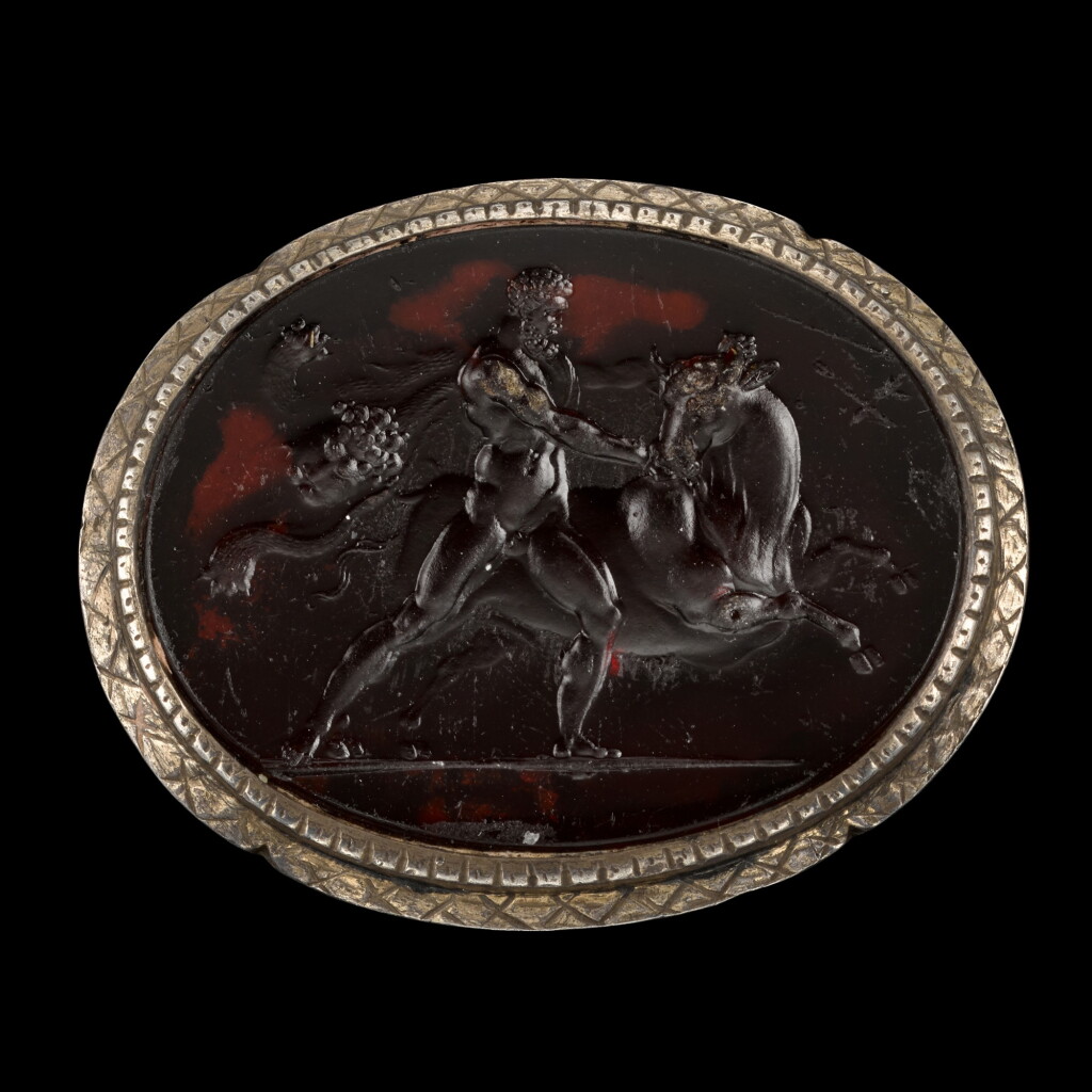 View full screen - View 1 of Lot 70. Italian, 19th century | Intaglio with Hercules Catching the Cretan Bull.
