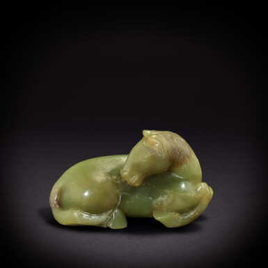 View full screen - View 1 of Lot 3558. A yellow jade recumbent horse, Qing dynasty, 17th century | 清十七世紀 黃玉臥馬.