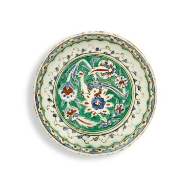 View full screen - View 1 of Lot 228. An Iznik polychrome pottery dish, Turkey, circa 1600.