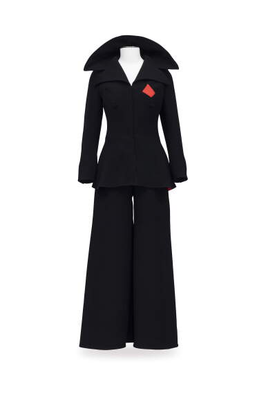 View full screen - View 1 of Lot 103. Balestra, Haute Couture, circa 1974, Wool jersey jumpsuit and waist-cinching jacket | Combinaison pantalon, veste ajustée.