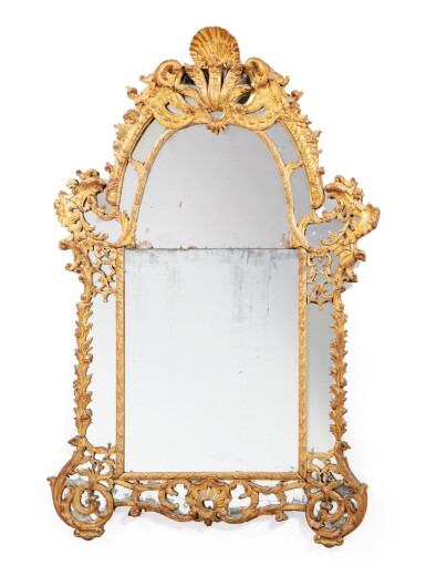 View full screen - View 1 of Lot 104. A giltwood mirror, French Régence, circa 1720 | Miroir à parecloses en bois doré d'époque Régence, vers 1720.