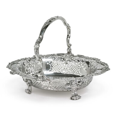 View full screen - View 1 of Lot 217. A GEORGE II ROYAL SILVER CAKE BASKET WITH THE ARMS OF FREDERICK, PRINCE OF WALES, GEORGE WICKES, LONDON, 1743.