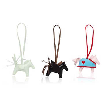 View full screen - View 1 of Lot 455. Set of Three: Vert Fizz Swift Rodeo PM Charm, 2025; Black, Etoupe Swift and Milo Rodeo Pegase PM Charm, 2025 ; Rose Darling, Rouge Radieux & Bleu Céleste Swift and Milo Rodeo Robeo Coeur PM Charm, 2025.