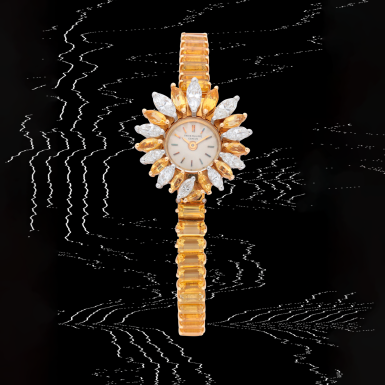 View full screen - View 1 of Lot 28. 'Heliodor', Reference 3267/44 | A yellow gold, beryl and diamond-set bracelet watch | Made in 1965.