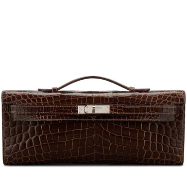 View full screen - View 1 of Lot 709. Macassar Shiny Niloticus Crocodile Kelly Cut Palladium Hardware, 2010.